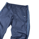 Nahaufnahme der Vorderseite mit elastischem Bund und kleinem Swoosh - Nike Trackpants in Dunkelblau, Größe XL